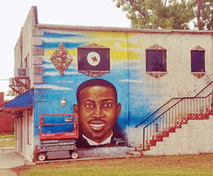 Freshly painted mural of Ahmaud Arbery in Brunswick, Georgia